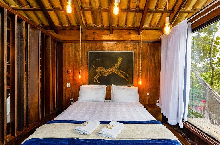 Microcasa Árvore na beira do lago vista incrível