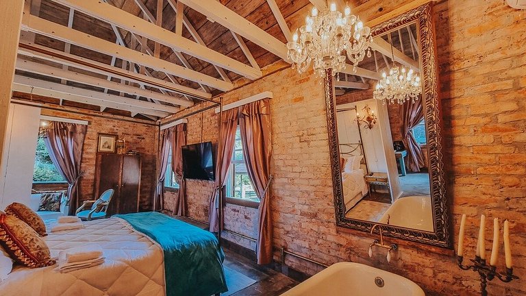 Casa histórica vista campo com banheira em Gramado