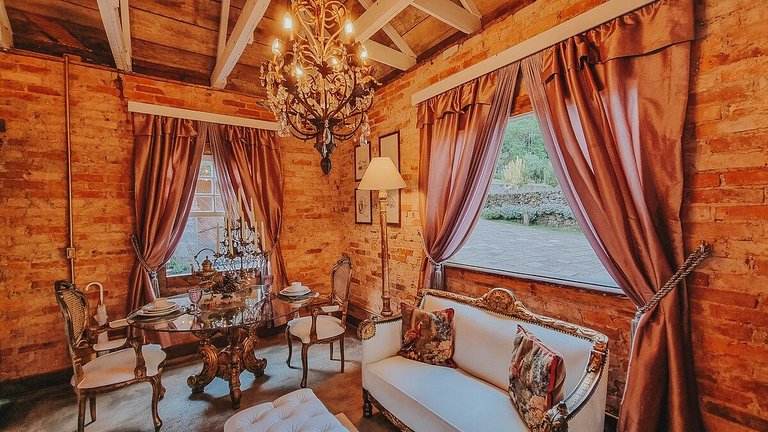 Casa histórica vista campo com banheira em Gramado