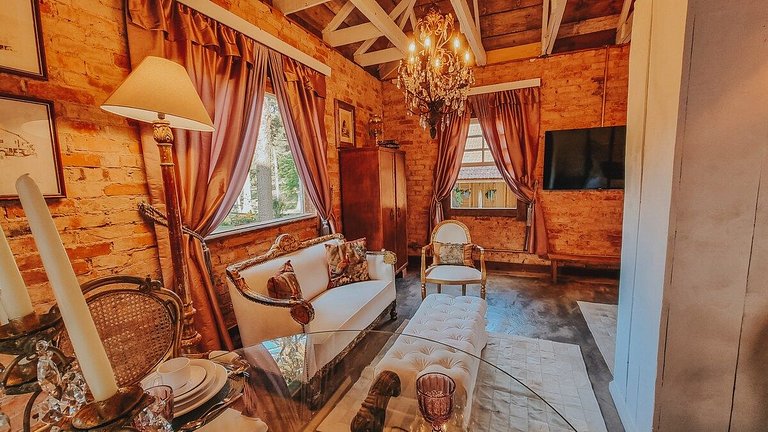 Casa histórica vista campo com banheira em Gramado