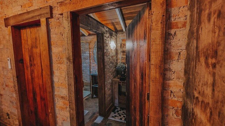 Casa histórica vista campo com banheira em Gramado