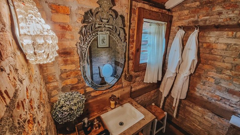 Casa histórica vista campo com banheira em Gramado
