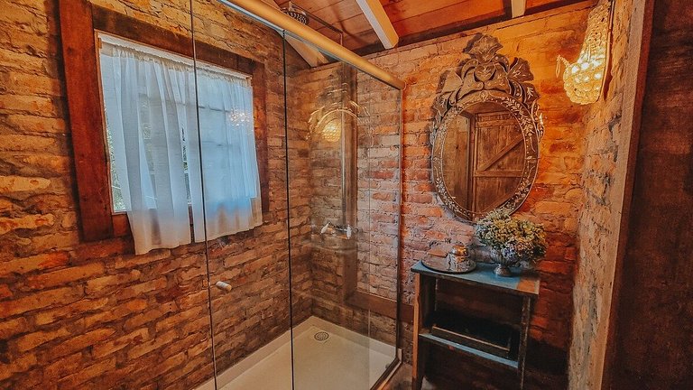 Casa histórica vista campo com banheira em Gramado
