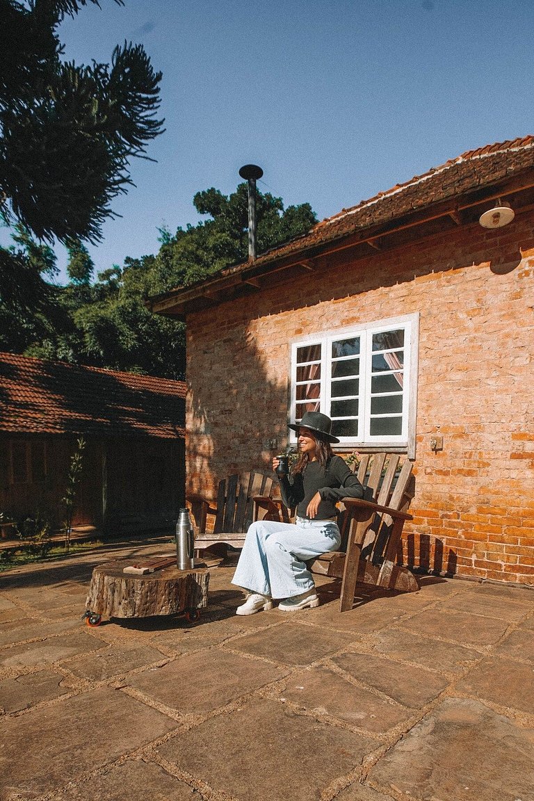 Casa histórica vista campo com banheira em Gramado
