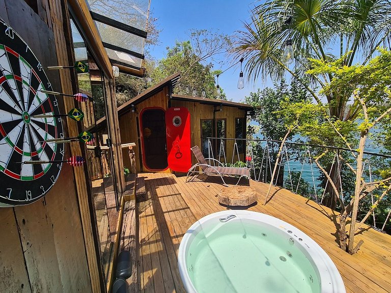 Microcasa Casa Barco na beira lago vista incrível