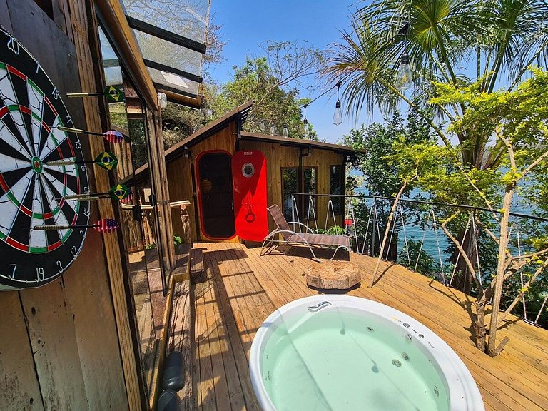 Microcasa Casa Barco na beira lago vista incrível