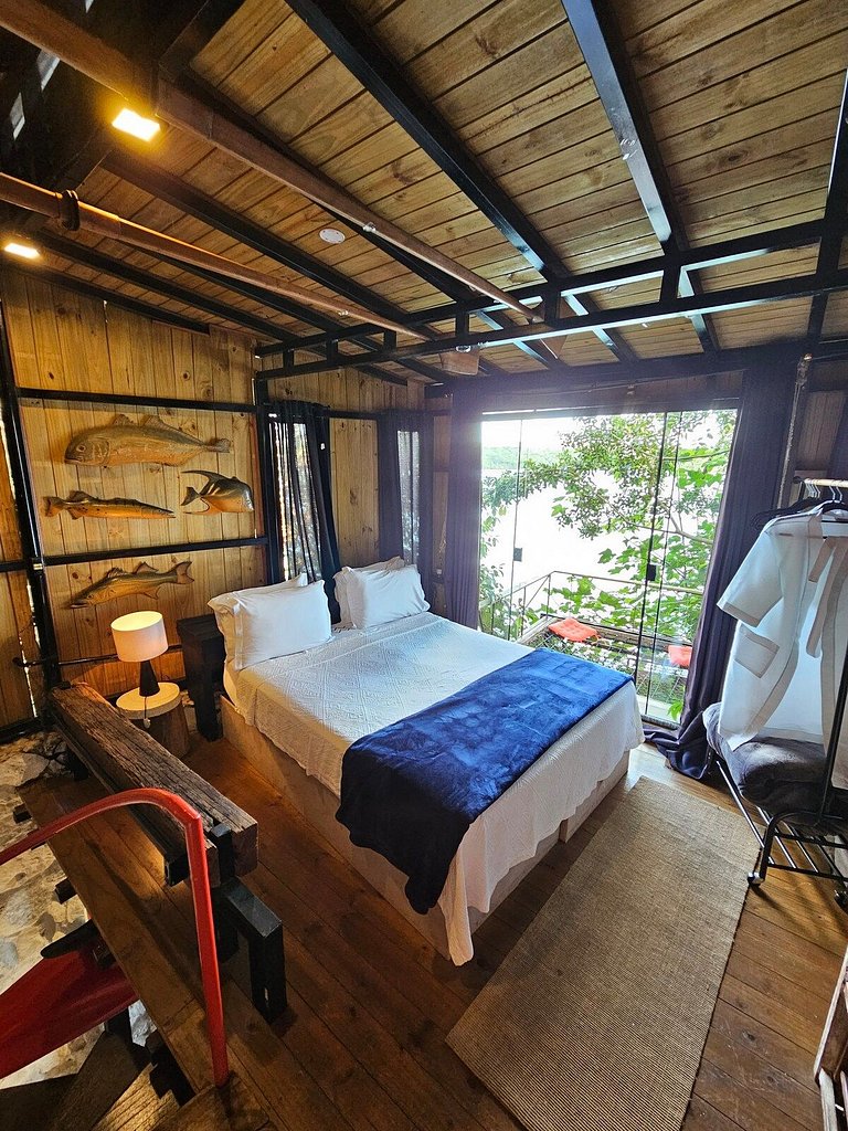 Microcasa Casa Barco na beira lago vista incrível